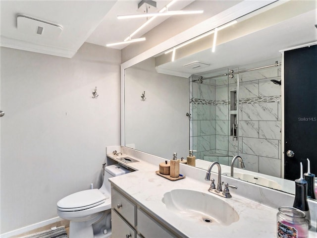 bathroom featuring oversized vanity and toilet