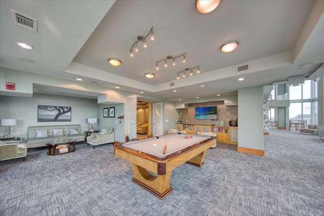 recreation room featuring a raised ceiling, carpet floors, and billiards