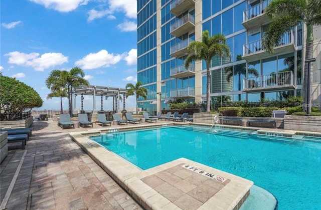 view of pool featuring a patio