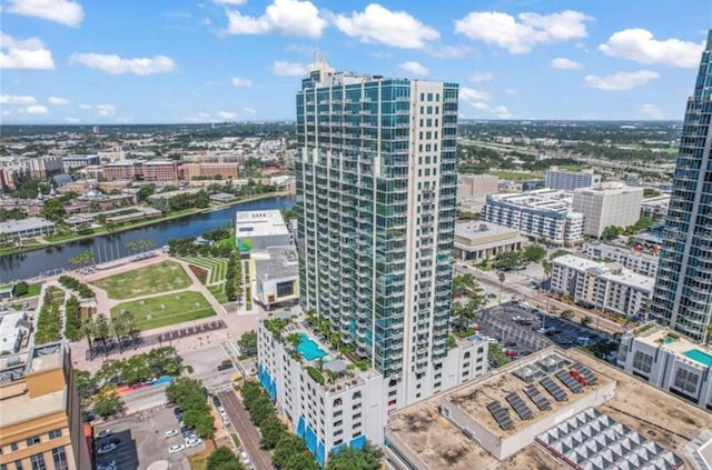 birds eye view of property with a water view