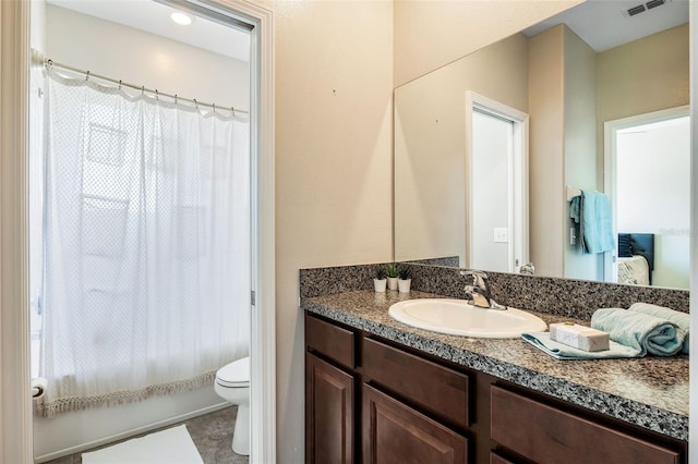 full bathroom with shower / bath combo with shower curtain, toilet, and vanity