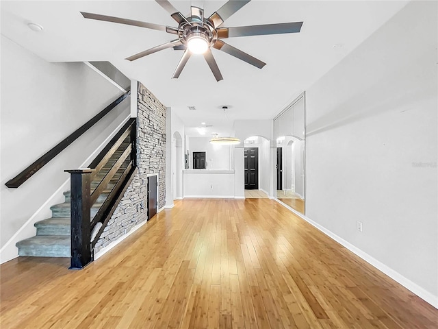 unfurnished living room with light hardwood / wood-style flooring