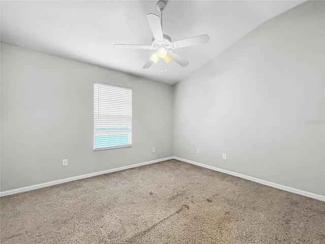 spare room with ceiling fan and carpet floors