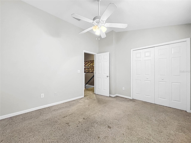 unfurnished bedroom featuring a closet, ceiling fan, and lofted ceiling