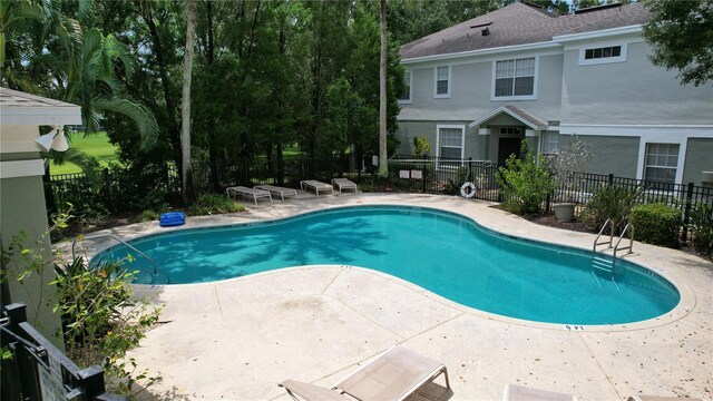 view of pool with a patio