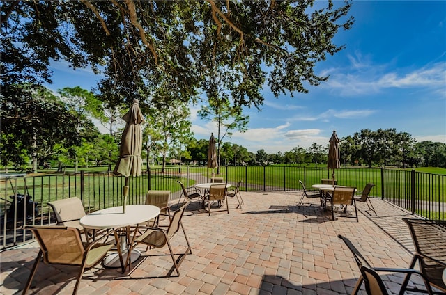 view of patio / terrace with fence and outdoor dining area