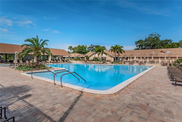 pool with a patio area