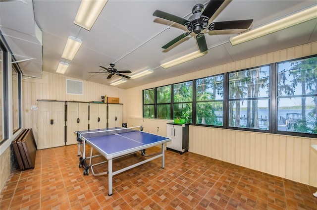 playroom featuring brick floor