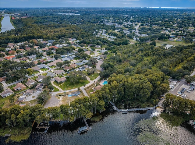 birds eye view of property with a residential view and a water view