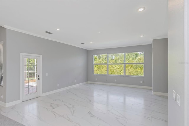 spare room with ornamental molding