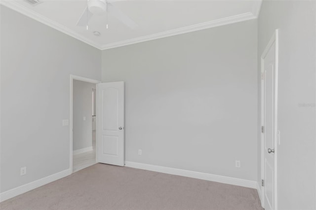 unfurnished room with light carpet, crown molding, and ceiling fan