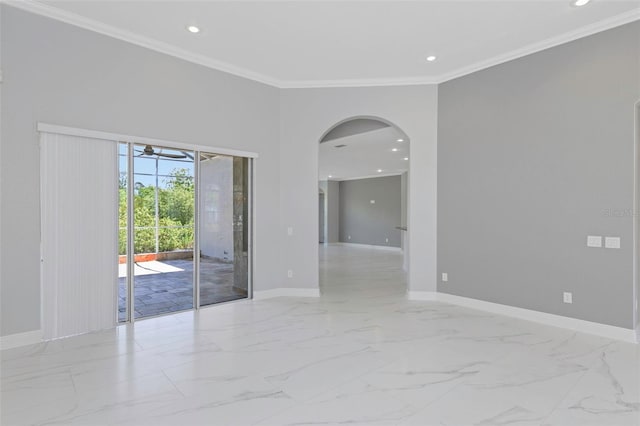 empty room featuring crown molding