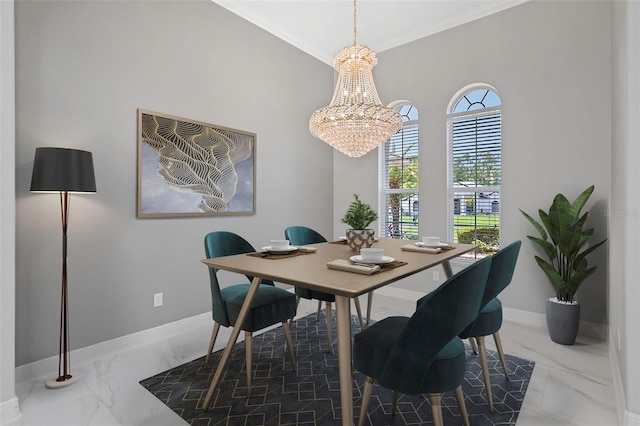 dining space featuring crown molding and an inviting chandelier