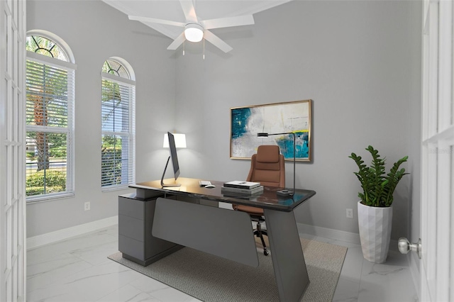 home office featuring ceiling fan and plenty of natural light