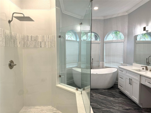 bathroom featuring vanity, crown molding, and independent shower and bath