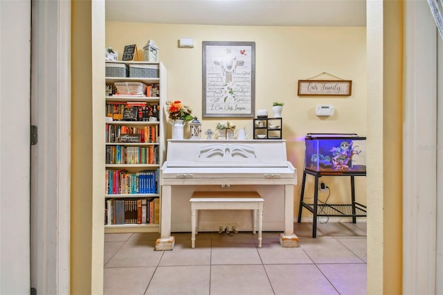 miscellaneous room with light tile patterned floors