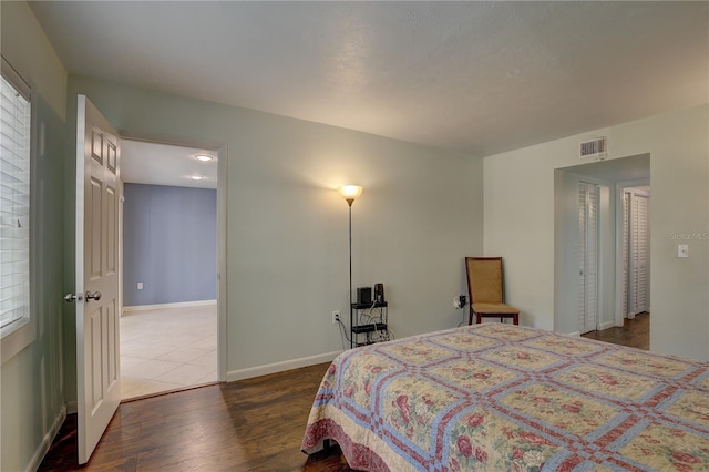 bedroom featuring dark wood-type flooring