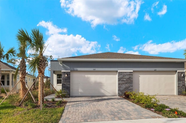 view of front of property with a garage