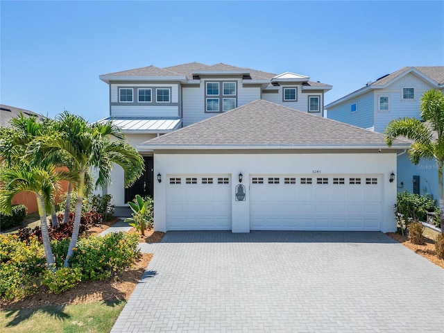 view of front of property featuring a garage