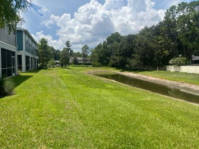 view of yard with a water view