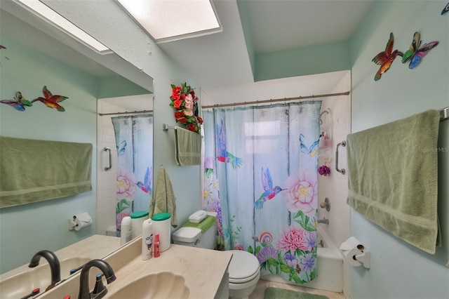 full bathroom with shower / bath combo with shower curtain, toilet, and vanity