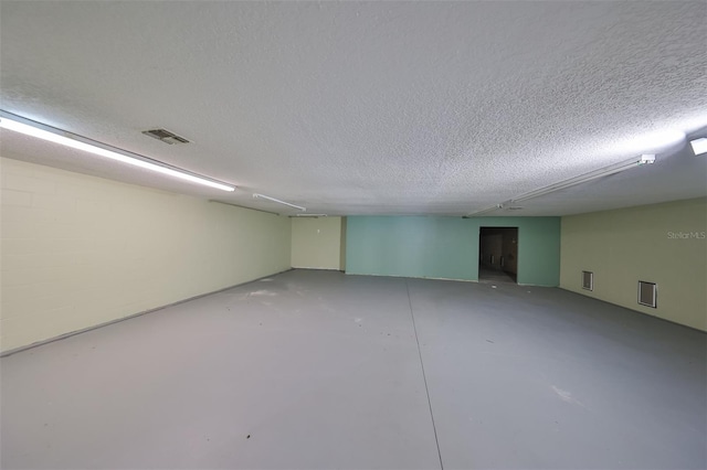 basement with a textured ceiling