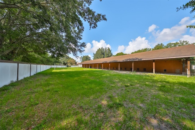 view of yard featuring fence