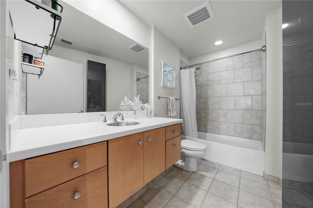 full bathroom with toilet, tile patterned floors, vanity, and shower / tub combo with curtain