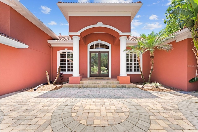 doorway to property with french doors