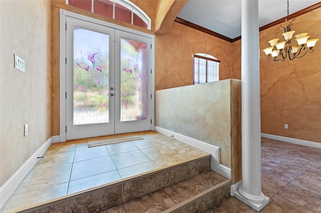 entrance foyer with french doors, plenty of natural light, and tile patterned flooring