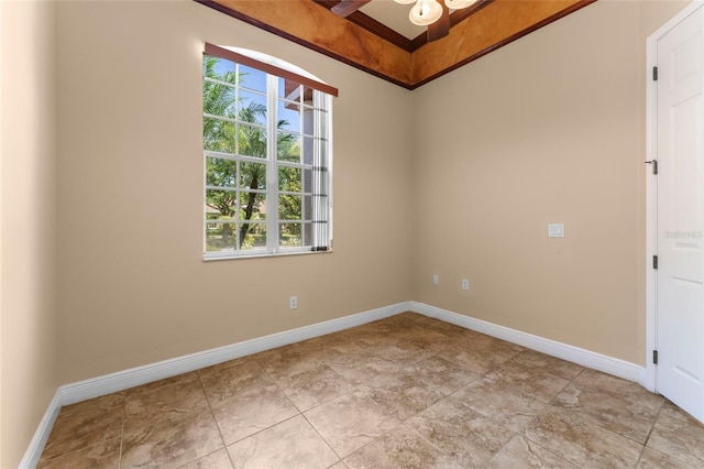 tiled empty room featuring ceiling fan