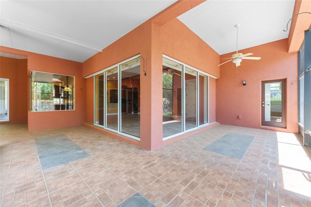 view of patio featuring ceiling fan