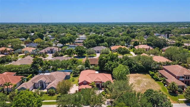 aerial view with a forest view and a residential view