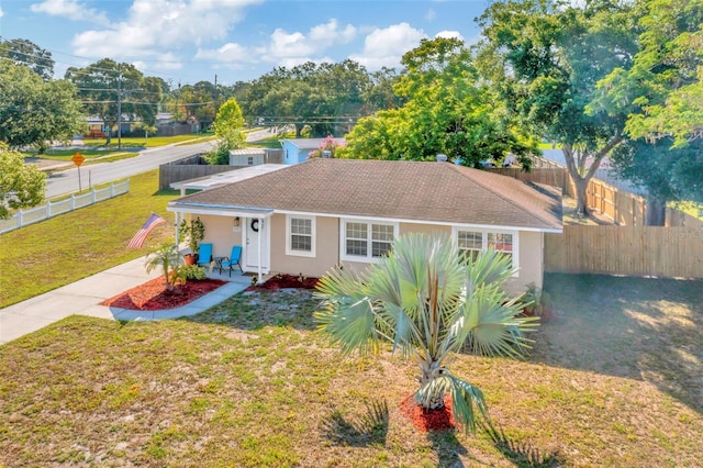 view of front of house featuring a porch and a front lawn