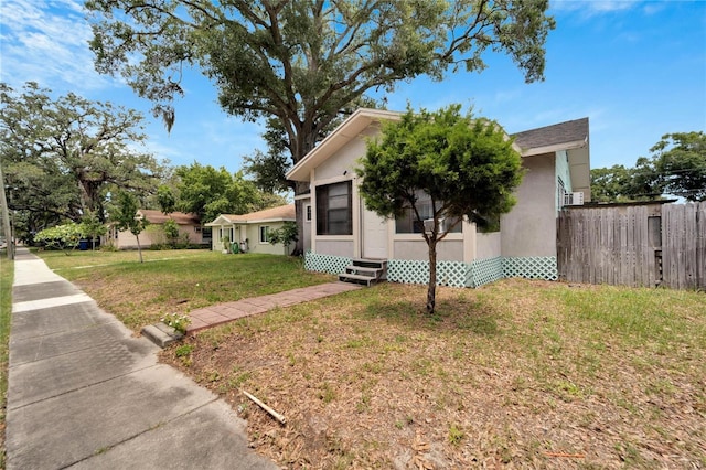 view of front of home with a front yard