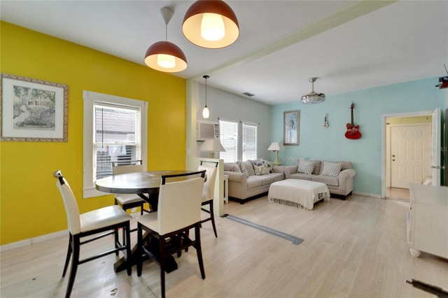 dining space featuring hardwood / wood-style flooring