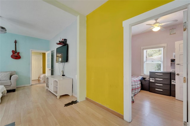 hallway featuring light hardwood / wood-style flooring