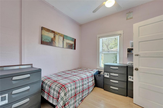 bedroom featuring ceiling fan and light wood-type flooring