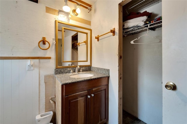 bathroom with vanity with extensive cabinet space