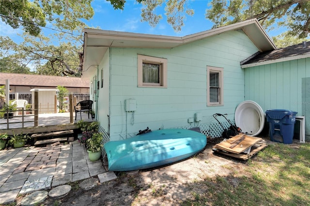 back of house featuring a deck