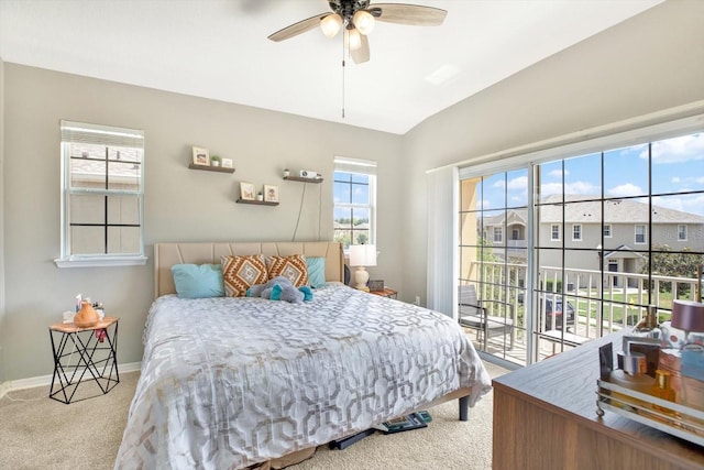 bedroom with ceiling fan, lofted ceiling, light carpet, and access to outside