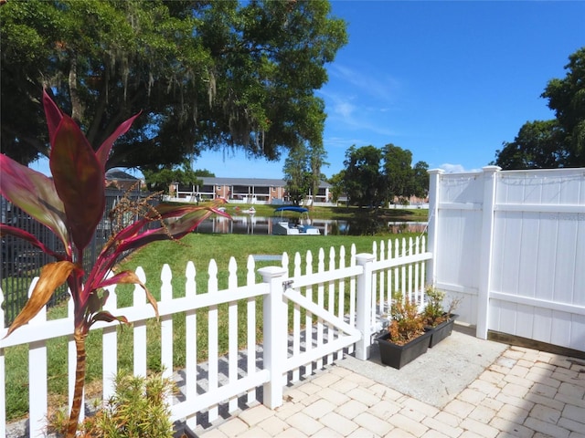 view of patio / terrace with a water view