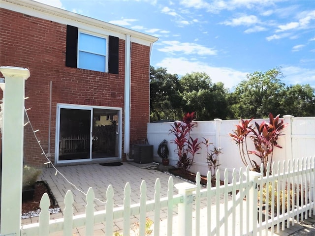 exterior space featuring central AC unit