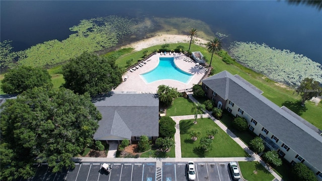 birds eye view of property featuring a water view