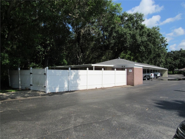 garage with a carport