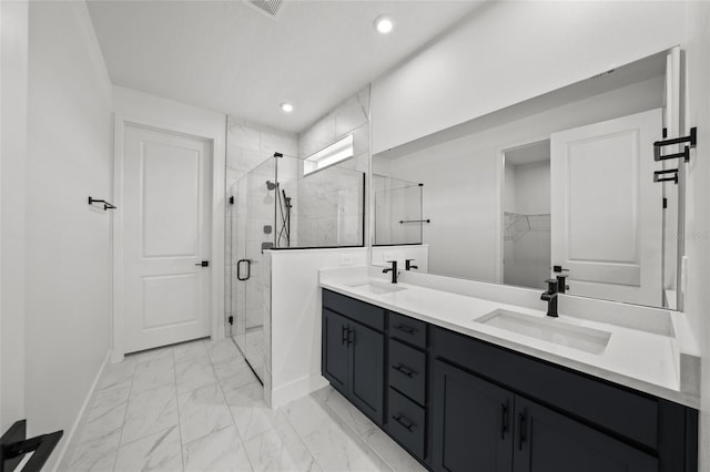 bathroom with vanity and walk in shower