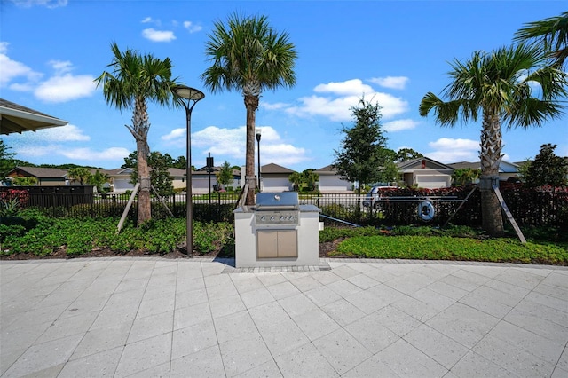 view of patio with a grill