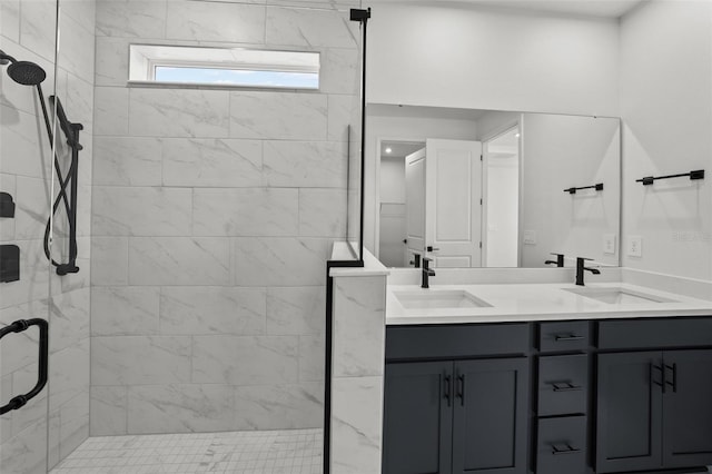 bathroom featuring vanity and an enclosed shower