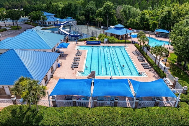 view of swimming pool with a patio area