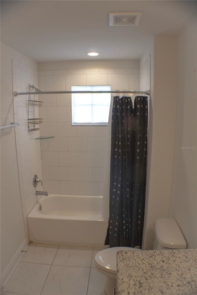 bathroom with shower / bathtub combination with curtain and toilet